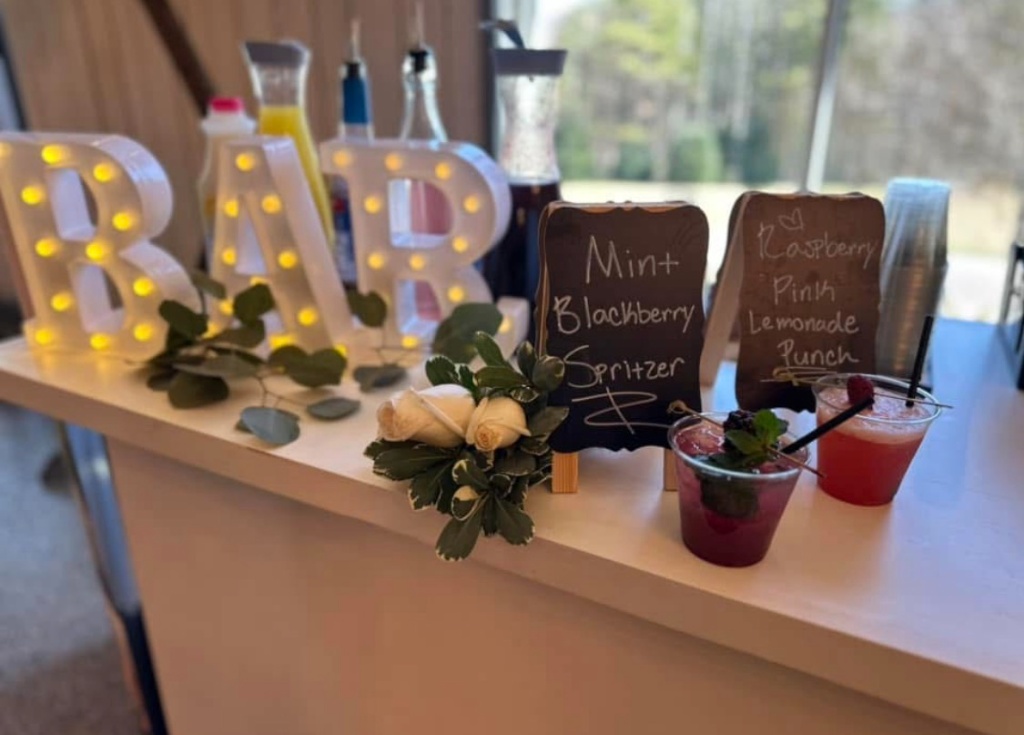 BAR marquee sign setup with cocktail menu chalkboards